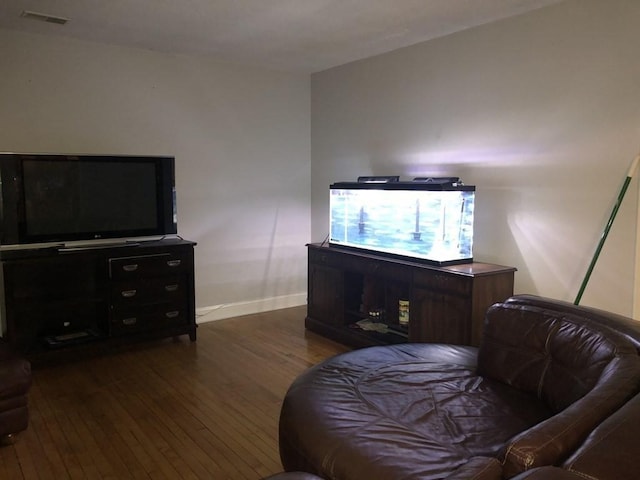 living area featuring dark hardwood / wood-style floors