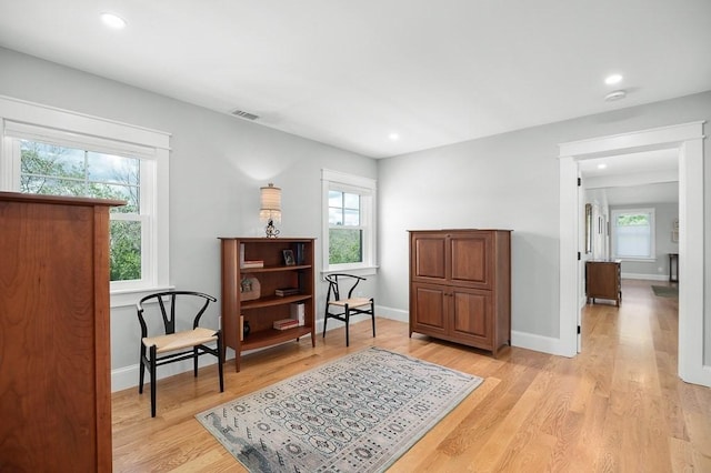 sitting room featuring light wood-type flooring