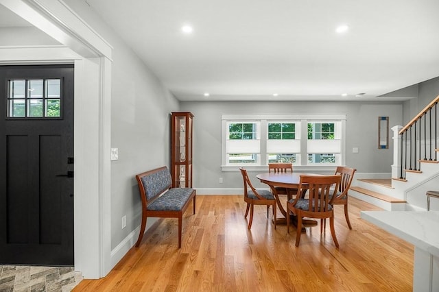 dining room with light wood-type flooring