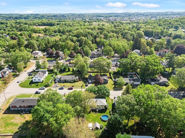 34 Woodland Cir, Methuen, MA 01844 - aerial view of residential area featuring a heavily wooded area