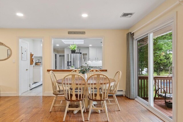 34 Woodland Cir, Methuen, MA 01844 - dining space with a baseboard heating unit, recessed lighting, light wood-style floors, and baseboards