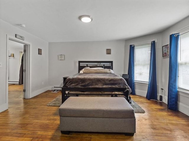 15-17 W Chestnut St, Brockton, MA 02301 - bedroom with a baseboard radiator and hardwood / wood-style floors
