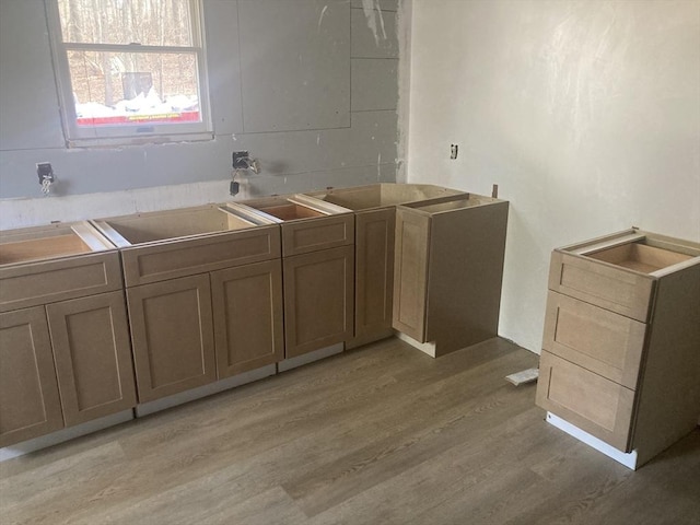 bathroom with wood finished floors