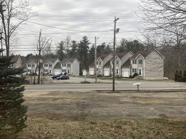 view of yard featuring a residential view