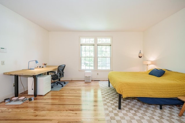 97 High Pine Cir Unit 97, Wilbraham, MA 01095 - bedroom featuring light wood-style flooring, baseboards, and an office area