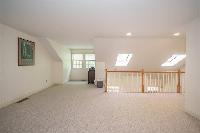 97 High Pine Cir Unit 97, Wilbraham, MA 01095 - additional living space with a skylight, carpet flooring, baseboards, and recessed lighting