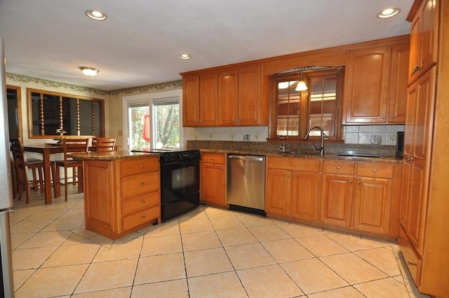 kitchen with recessed lighting, dishwasher, black range with electric stovetop, dark stone countertops, and brown cabinets