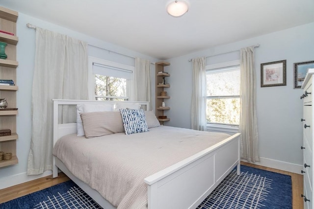 bedroom featuring dark hardwood / wood-style floors