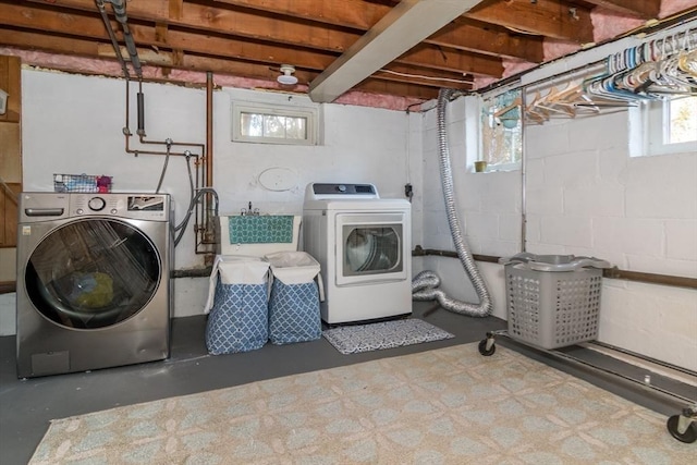 washroom featuring washer and dryer