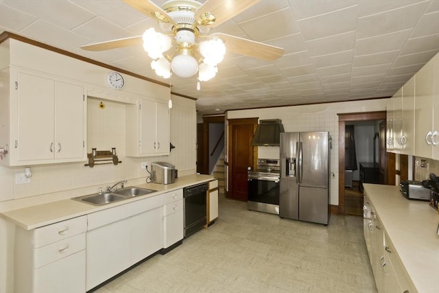 kitchen with appliances with stainless steel finishes, white cabinets, and light countertops