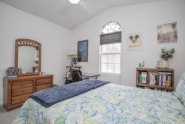 carpeted bedroom with lofted ceiling and ceiling fan