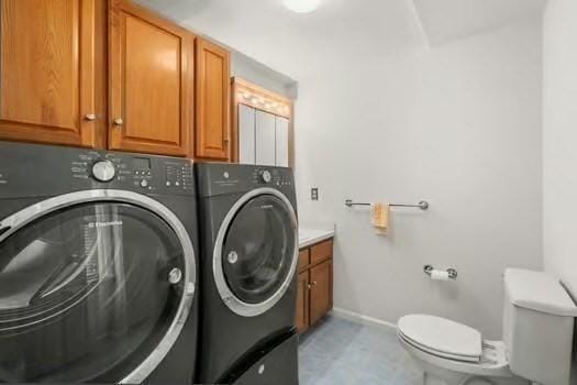 5 Saint John Ln Unit 5, Milford, MA 01757 - laundry area featuring separate washer and dryer and cabinet space