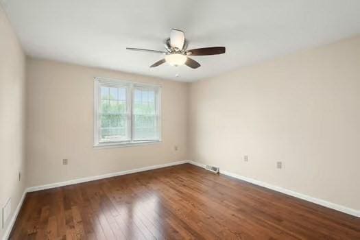 5 Saint John Ln Unit 5, Milford, MA 01757 - unfurnished room with dark wood finished floors and ceiling fan