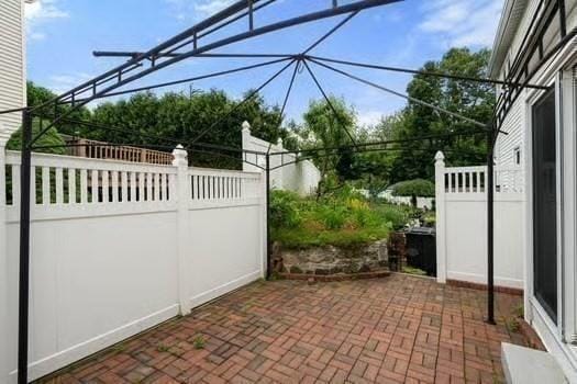 5 Saint John Ln Unit 5, Milford, MA 01757 - view of patio / terrace with a gate