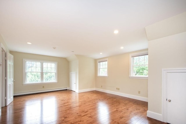 265 King St, Cohasset, MA 02025 - unfurnished room with baseboard heating, wood finished floors, and recessed lighting