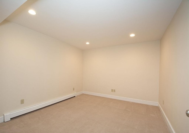 265 King St, Cohasset, MA 02025 - empty room featuring a baseboard heating unit, recessed lighting, and light colored carpet