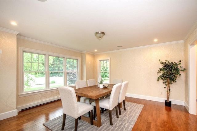 265 King St, Cohasset, MA 02025 - dining area featuring a baseboard heating unit, hardwood / wood-style floors, ornamental molding, and recessed lighting
