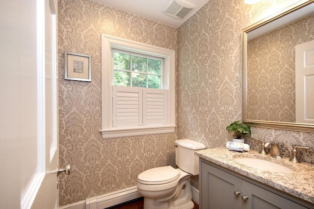 265 King St, Cohasset, MA 02025 - half bath featuring vanity, wallpapered walls, and a baseboard radiator
