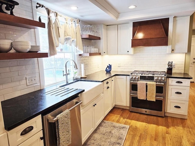 15 Sudbury Rd, Stow, MA 01775 - kitchen featuring stainless steel appliances, open shelves, custom exhaust hood, dark countertops, and tasteful backsplash
