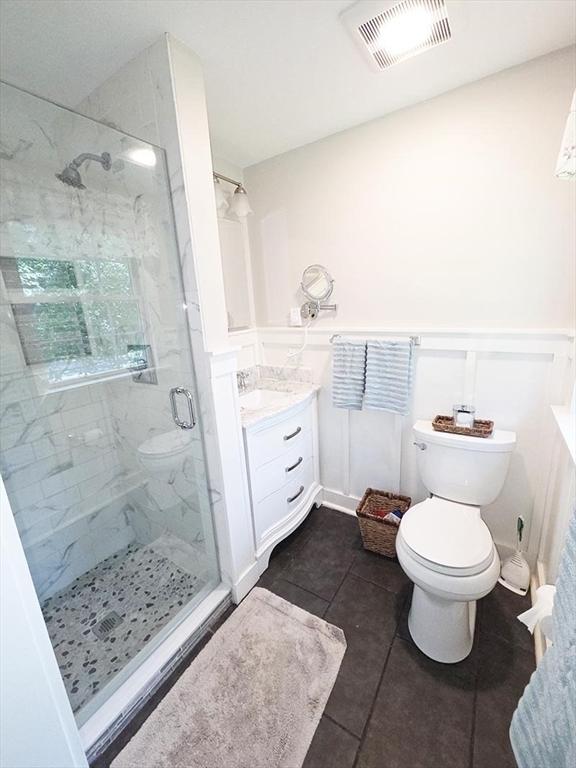 15 Sudbury Rd, Stow, MA 01775 - bathroom with a stall shower, tile patterned flooring, and vanity