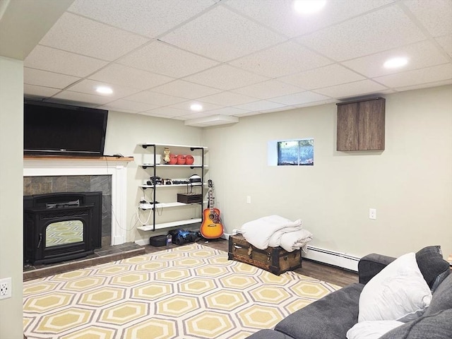 15 Sudbury Rd, Stow, MA 01775 - living room with baseboard heating, recessed lighting, a paneled ceiling, and wood finished floors