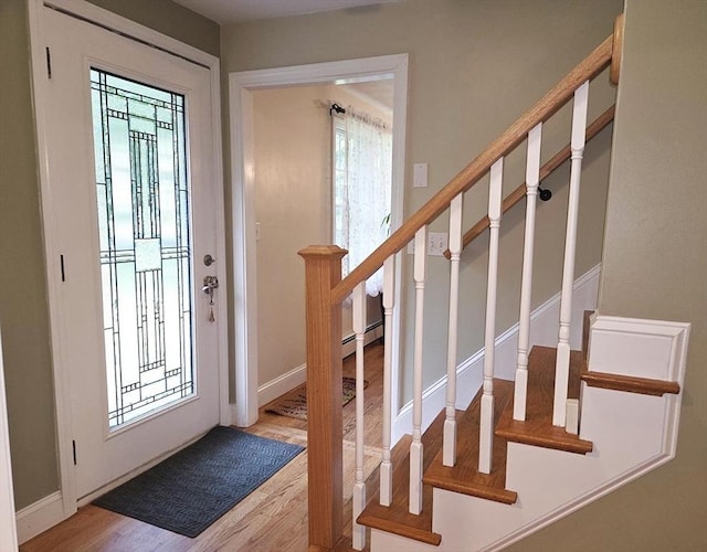 15 Sudbury Rd, Stow, MA 01775 - foyer with wood finished floors and stairs
