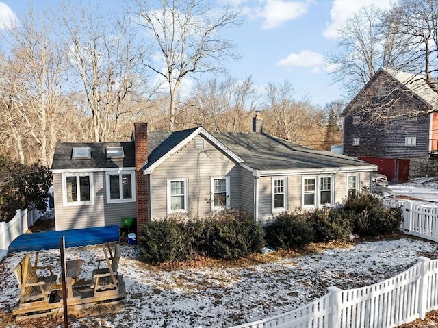 view of snow covered house