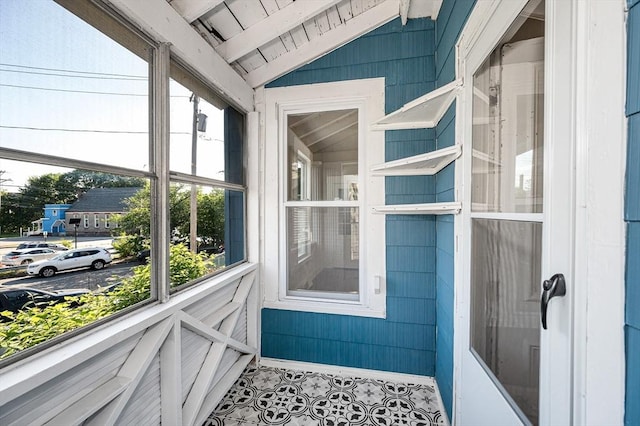11-13 Read St, Lowell, MA 01850 - unfurnished sunroom featuring vaulted ceiling