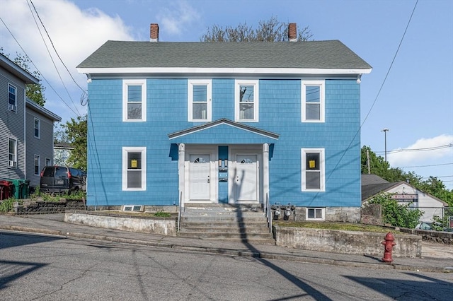 11-13 Read St, Lowell, MA 01850 - view of front facade featuring a chimney