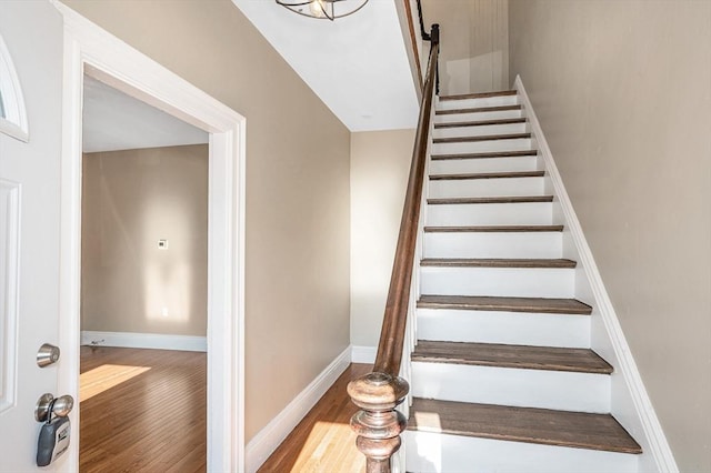 11-13 Read St, Lowell, MA 01850 - staircase featuring wood finished floors and baseboards