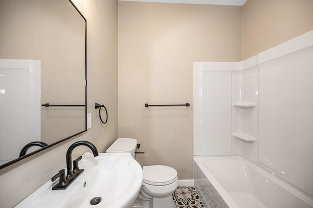 11-13 Read St, Lowell, MA 01850 - full bathroom featuring a sink, toilet, tile patterned flooring, and baseboards
