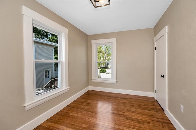 11-13 Read St, Lowell, MA 01850 - unfurnished room featuring wood finished floors and baseboards
