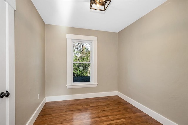 11-13 Read St, Lowell, MA 01850 - spare room featuring baseboards and dark wood finished floors