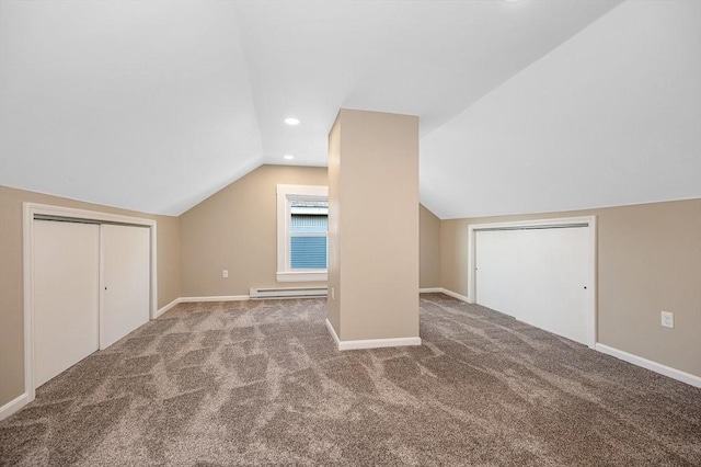 11-13 Read St, Lowell, MA 01850 - bonus room with baseboard heating, vaulted ceiling, carpet, baseboards, and recessed lighting