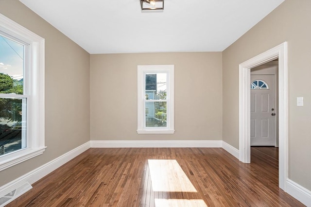 11-13 Read St, Lowell, MA 01850 - spare room featuring hardwood / wood-style flooring and baseboards