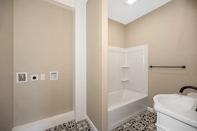 11-13 Read St, Lowell, MA 01850 - full bath with baseboards, tile patterned floors, vanity, and bathing tub / shower combination