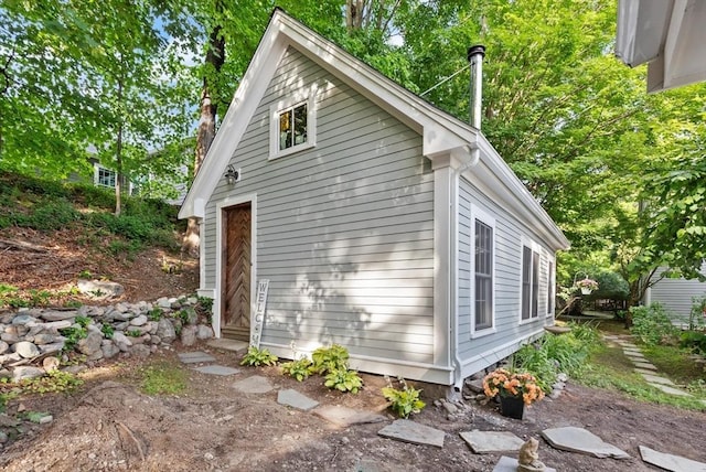 1395 Canton Ave, Milton, MA 02186 - view of property exterior with a chimney