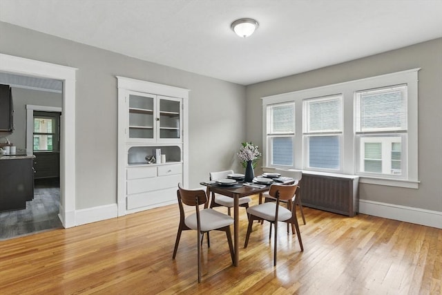31-33 Beauchamp St, Springfield, MA 01107 - dining space featuring light wood-style flooring, baseboards, and a desk