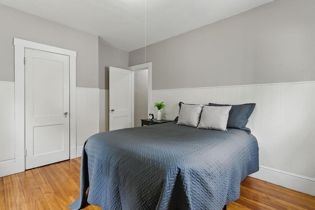 31-33 Beauchamp St, Springfield, MA 01107 - bedroom featuring wood finished floors and a wainscoted wall