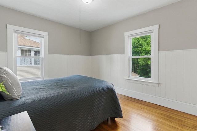 31-33 Beauchamp St, Springfield, MA 01107 - bedroom with wainscoting and wood finished floors