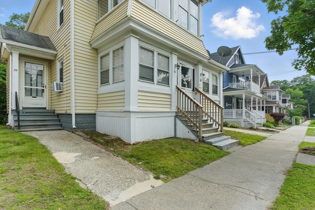 31-33 Beauchamp St, Springfield, MA 01107 - view of side of home with a balcony and entry steps