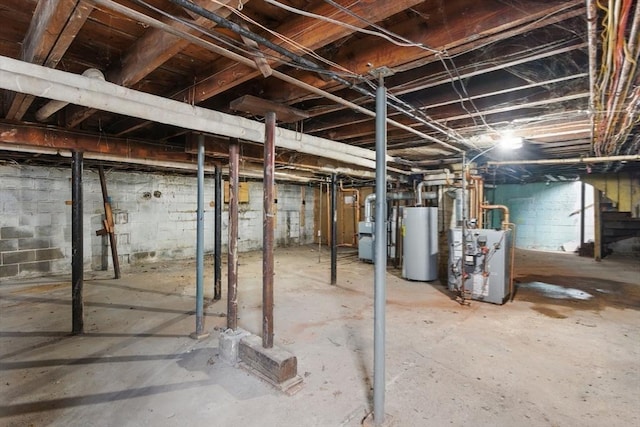 31-33 Beauchamp St, Springfield, MA 01107 - unfinished basement with gas water heater and a heating unit