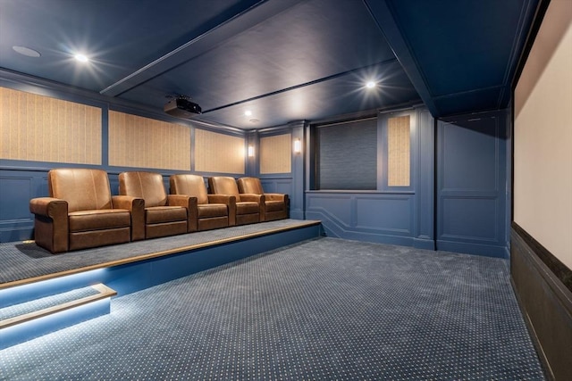 home theater with carpet flooring, recessed lighting, and a decorative wall