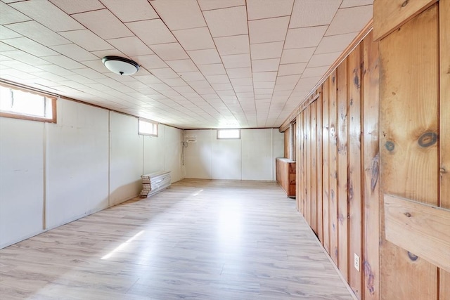 24 Harwich Rd, East Longmeadow, MA 01028 - basement with light wood-style floors and wooden walls