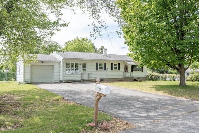 24 Harwich Rd, East Longmeadow, MA 01028 - single story home featuring asphalt driveway, an attached garage, a front yard, and a chimney