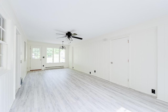 24 Harwich Rd, East Longmeadow, MA 01028 - unfurnished living room with a baseboard radiator, light wood-style flooring, ceiling fan, and a decorative wall