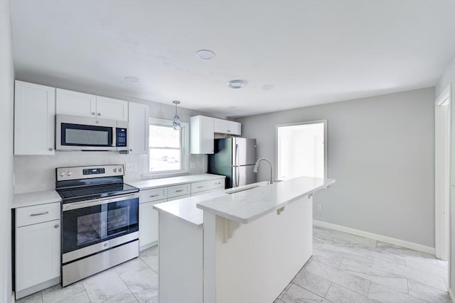 24 Harwich Rd, East Longmeadow, MA 01028 - kitchen with appliances with stainless steel finishes, light marble finish floors, light countertops, and white cabinets
