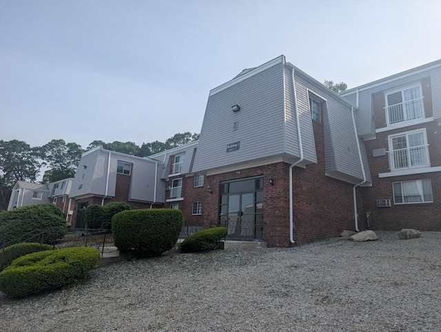 300 Smithfield Rd Unit 2-2, North Providence, RI 02904 - view of home's exterior with brick siding