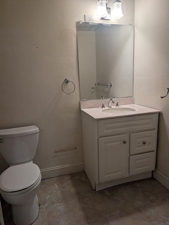 300 Smithfield Rd Unit 2-2, North Providence, RI 02904 - bathroom with vanity, toilet, and baseboards