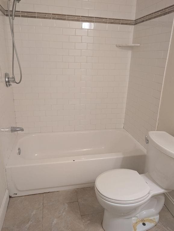 300 Smithfield Rd Unit 2-2, North Providence, RI 02904 - bathroom with toilet, shower / washtub combination, tile patterned floors, and baseboards